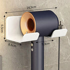 Soporte de pared para secador y plancha